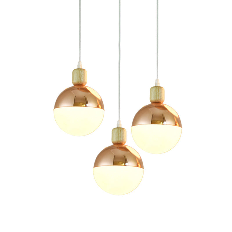 Modernist Rose Gold multi-pendant dining room light with Opal Glass Shade