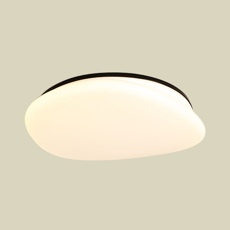 Modern Stone-Shaped LED Ceiling Mount in Black and White for Bedrooms
