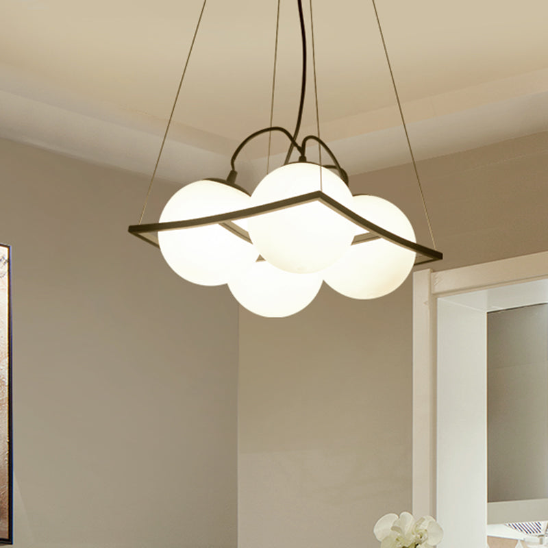 Modernist Frosted Glass Pendant Light With Globe Design - 3/4 Lights Black Frame For Ceiling Hang 4