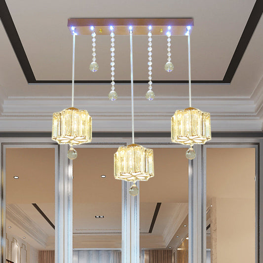 Contemporary Gold Blossom Pendant Light with Crystal Facets - 3 Bulbs - Linear Canopy