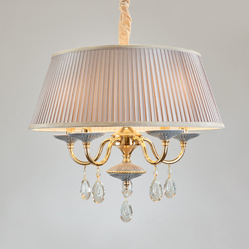 Lustre suspendu minimaliste en tissu avec des gouttes de cristal